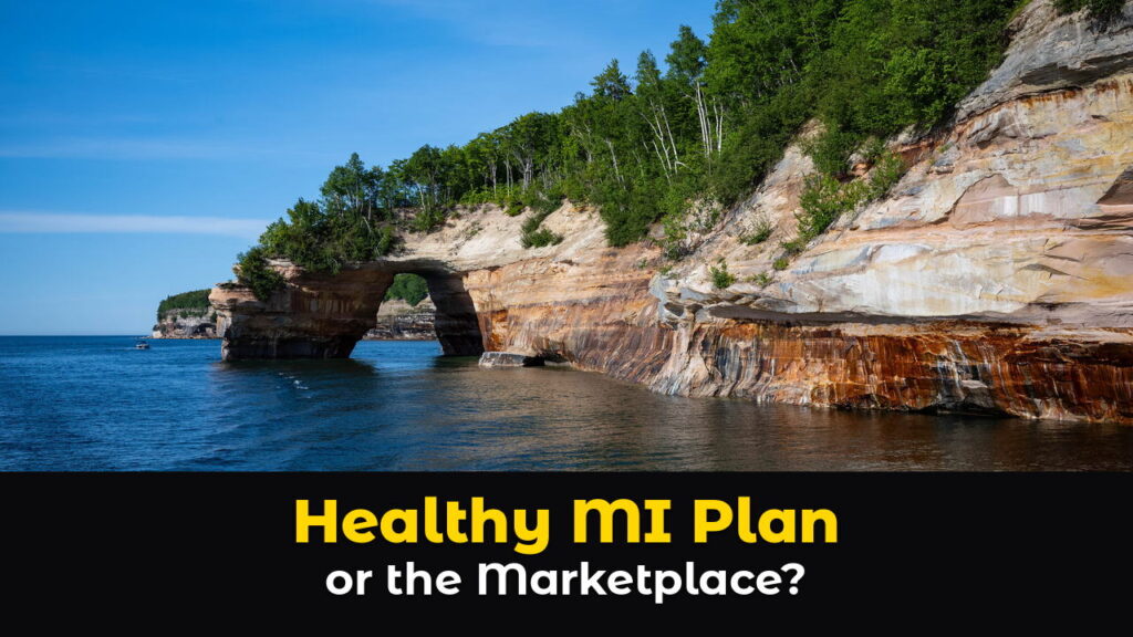 A natural sandstone arch streaked with orange, tan, and white minerals reaching into the deep blue water of Lake Superior at Pictured Rocks National Lakeshore in Michigan's Upper Peninsula, with green trees on top and a clear blue sky, above hook text: Healthy MI Plan or the Marketplace?